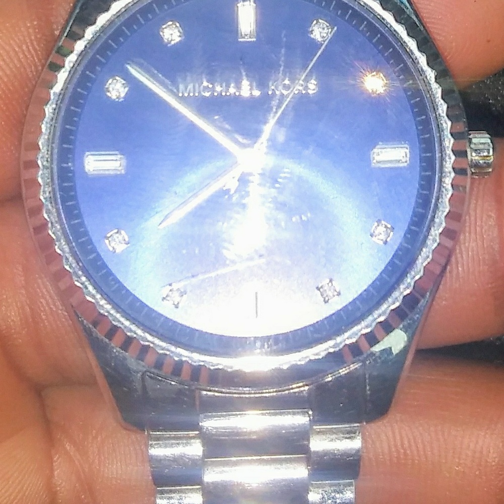 Stainless steel Michael kors womens watch.